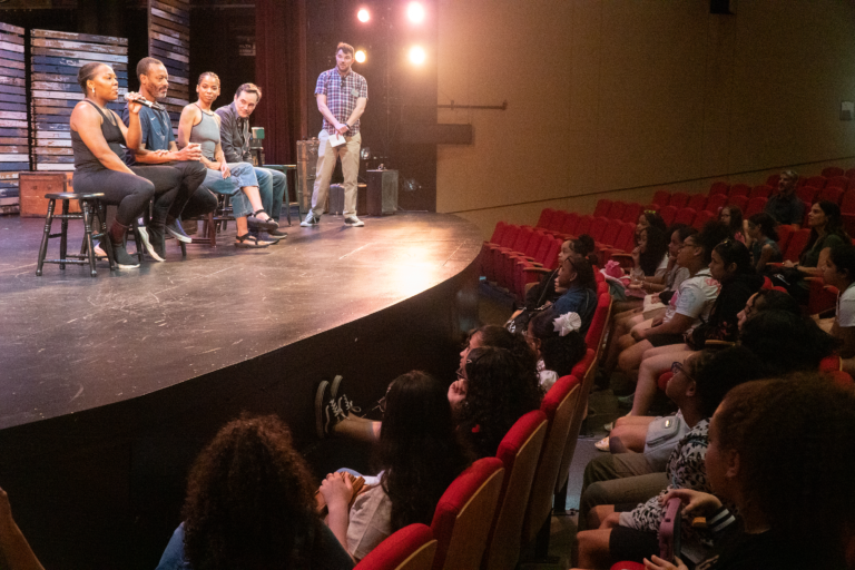 Students on a Kyock Foundation Arts Immersion Trip engage with actors during a Q&A