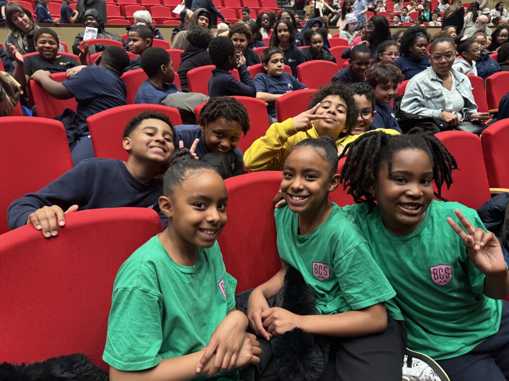 Students in their seats at the Wheelock Family Theater on a Kynock Arts Immersion Trip.
